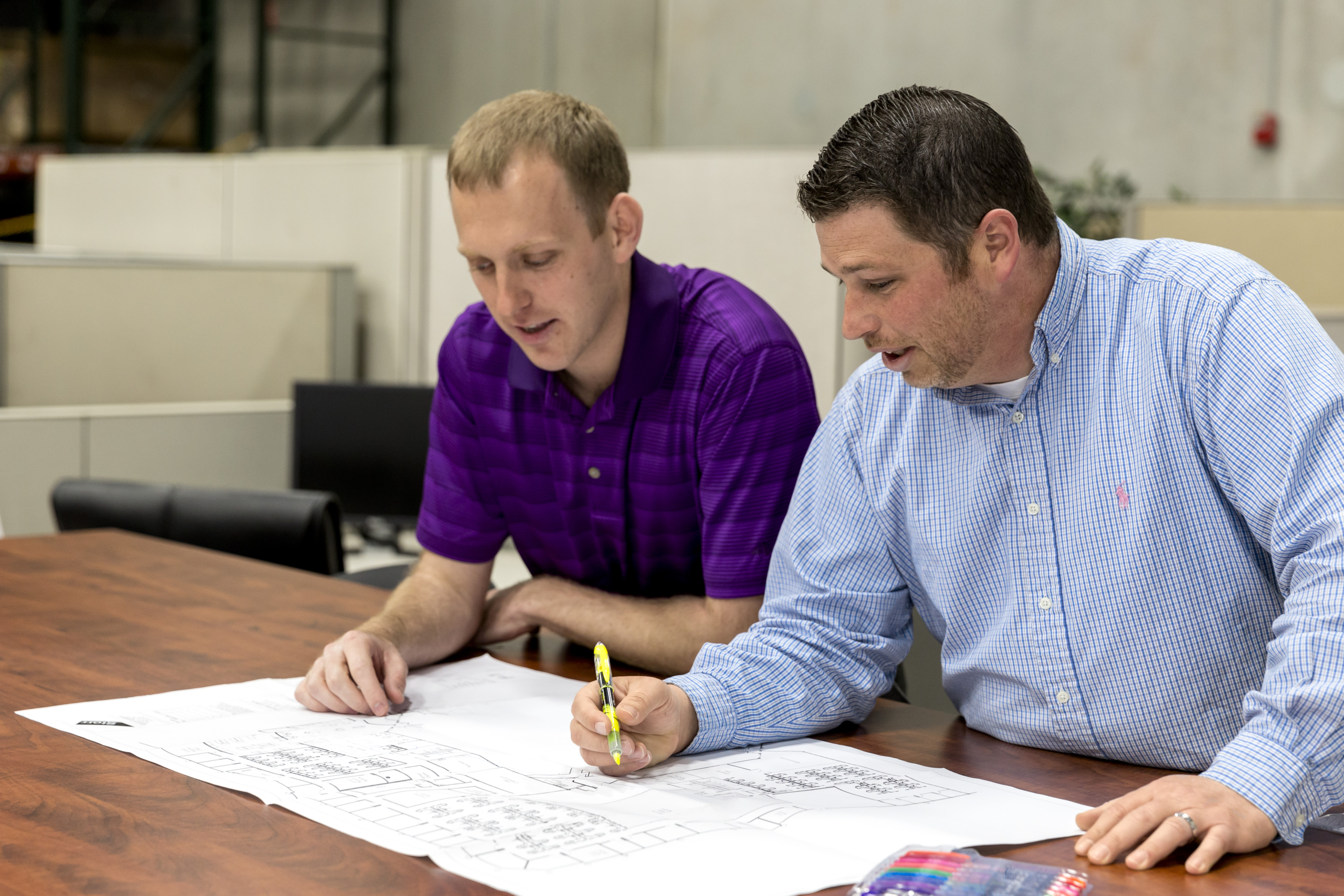 Services-Project-Mangement-3 project managers reviewing plans before installation